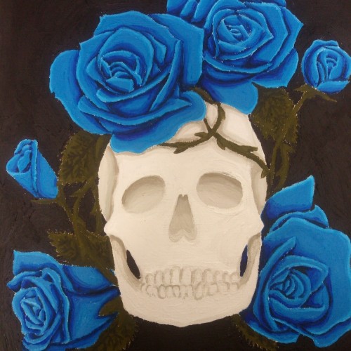 Skull covered in Blue Roses